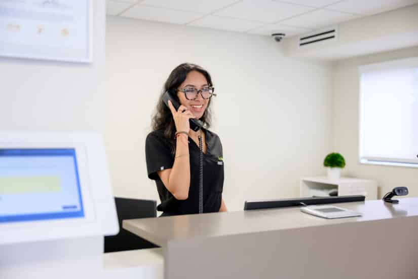 Woman Attending the Phone in Accident Clinic In Doral
